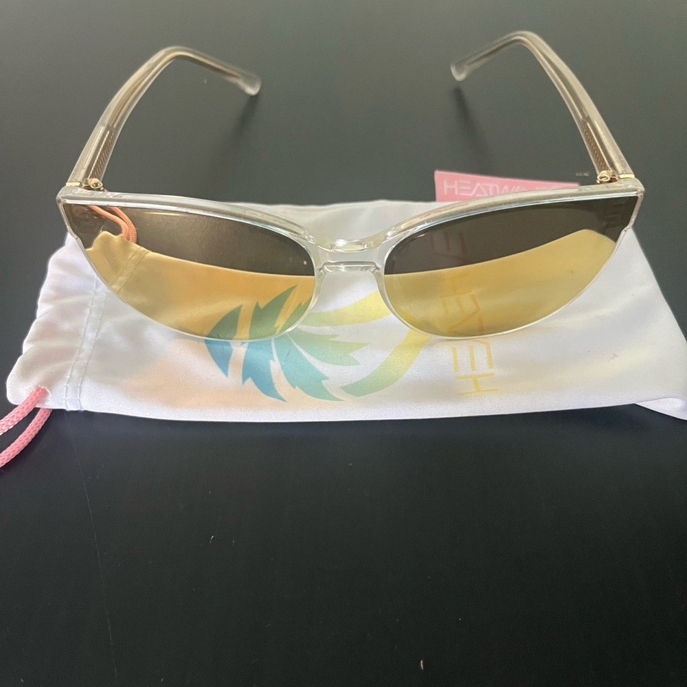 Clear Frame Women’s Sunglasses with Gold Lenses